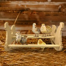 Load image into Gallery viewer, Wooden chicken rocker roosting bar with chicks sitting on it inside the coop