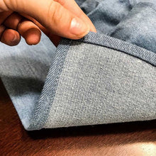 Load image into Gallery viewer, a denim egg collecting apron close up on stitching