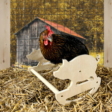 Load image into Gallery viewer, Wooden pig rocker perch with chicken sitting on it inside the coop.
