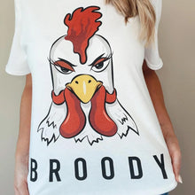 Load image into Gallery viewer, A girl wearing a white t-shirt with a chicken illustration on it with the word Broody

